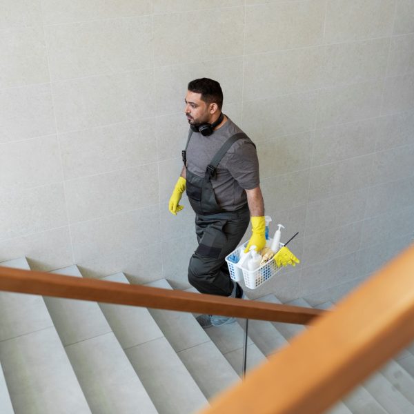 full-shot-man-walking-stairs