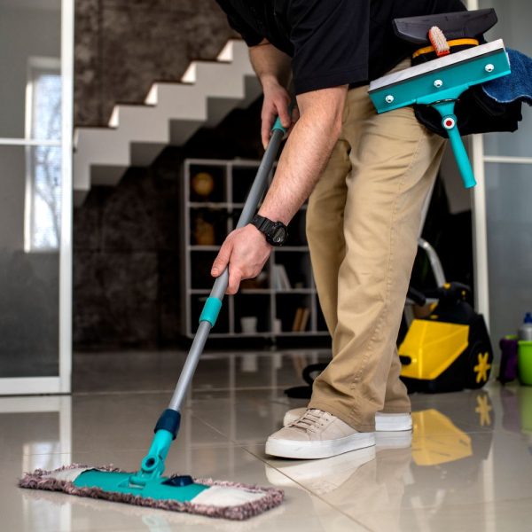 man-doing-professional-home-cleaning-service